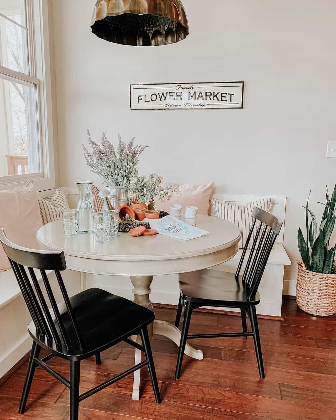 Round White Table With Black Windsor Chairs