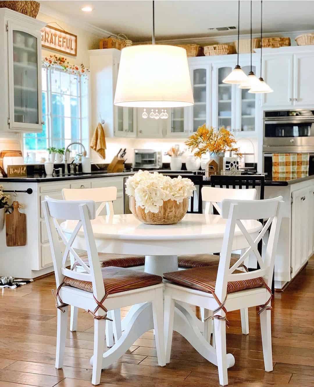 Striped Seat Cushions Add Warmth to White Chairs