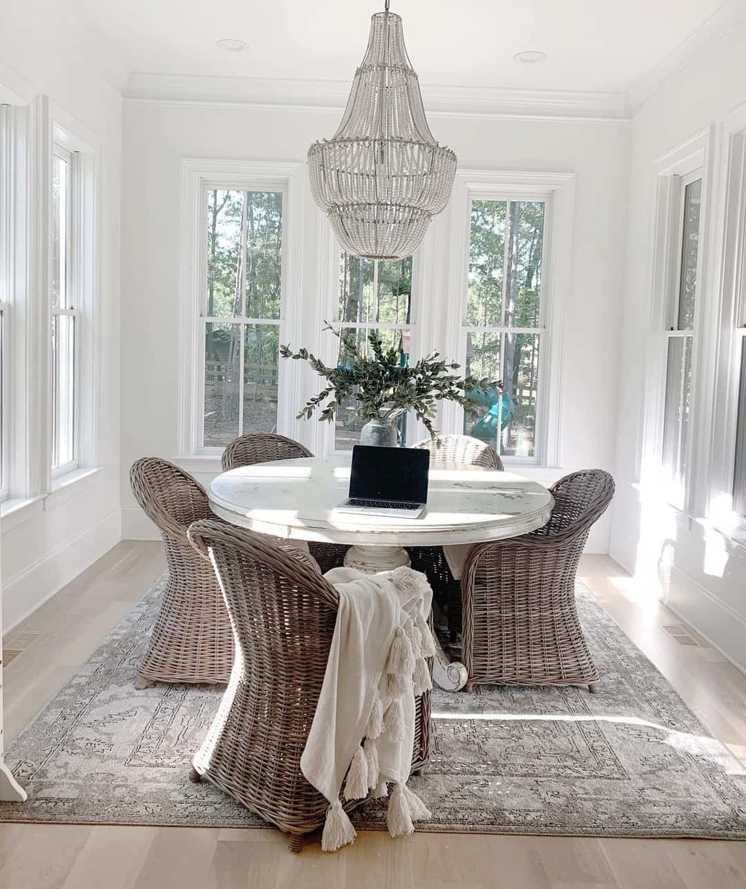 Distressed White Round Table With Woven Chairs