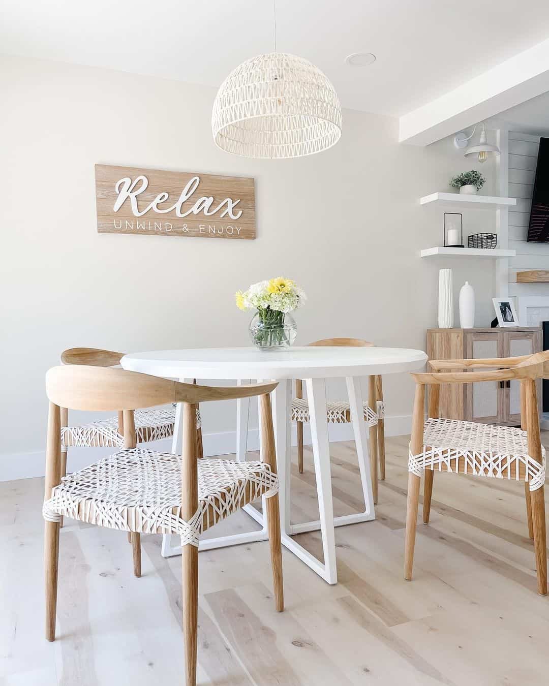 White Round Table With Angular Metal Legs
