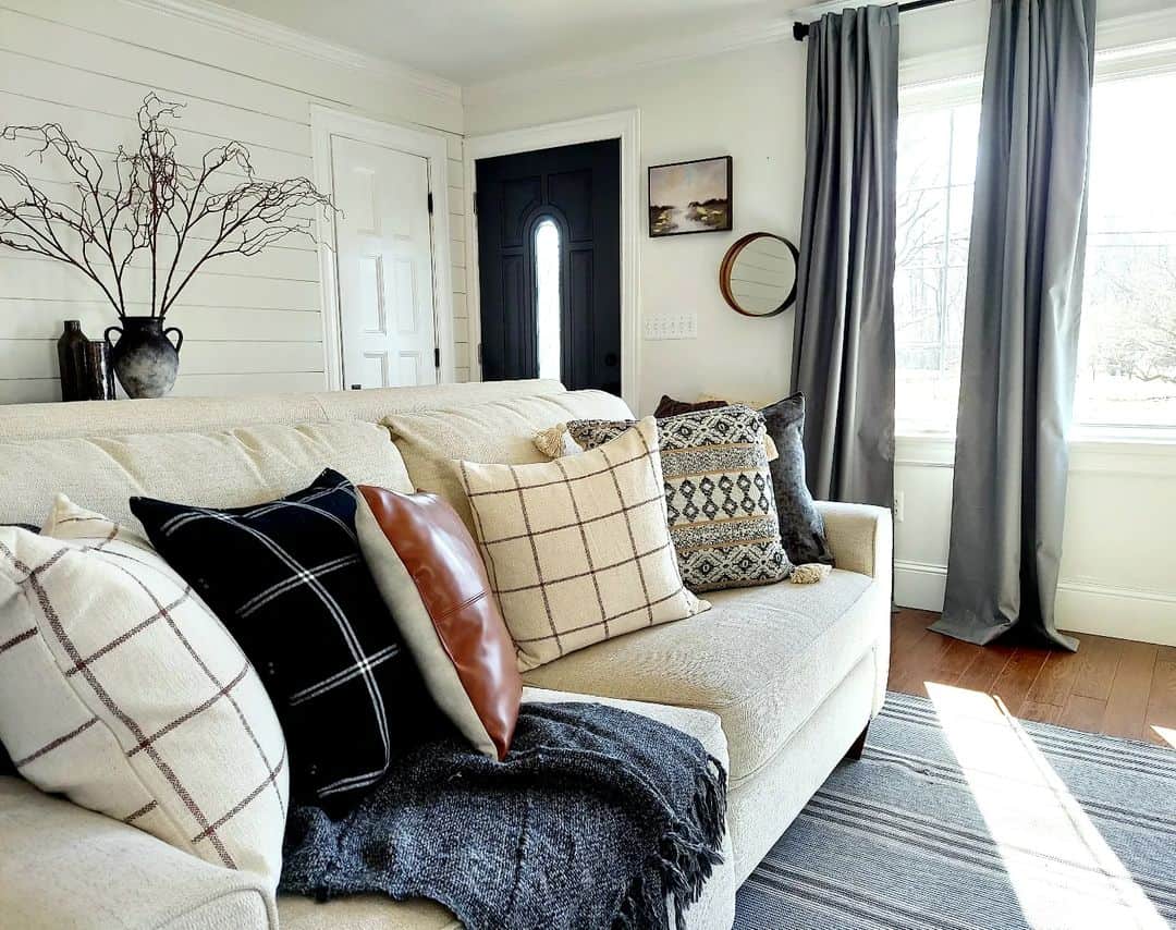 Layered Pillows Add Cozy Texture to a Neutral Sofa