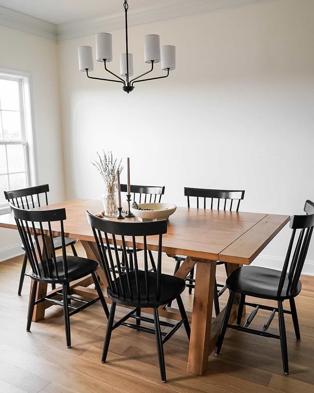 Ground Your Natural Wood Dining Table with Black Spindle Chairs