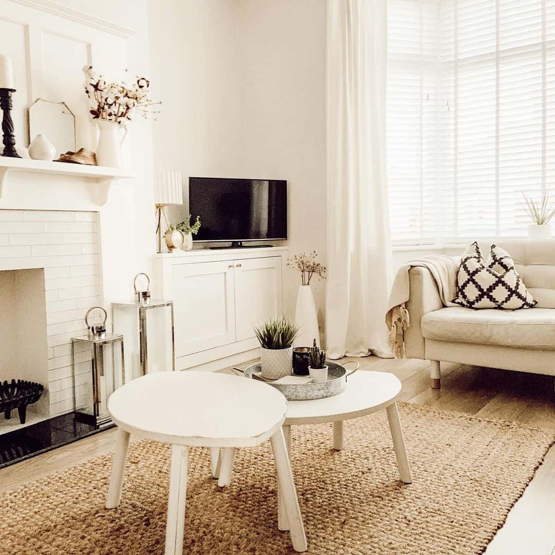Round Pedestal Tables Create a Layered Coffee Table