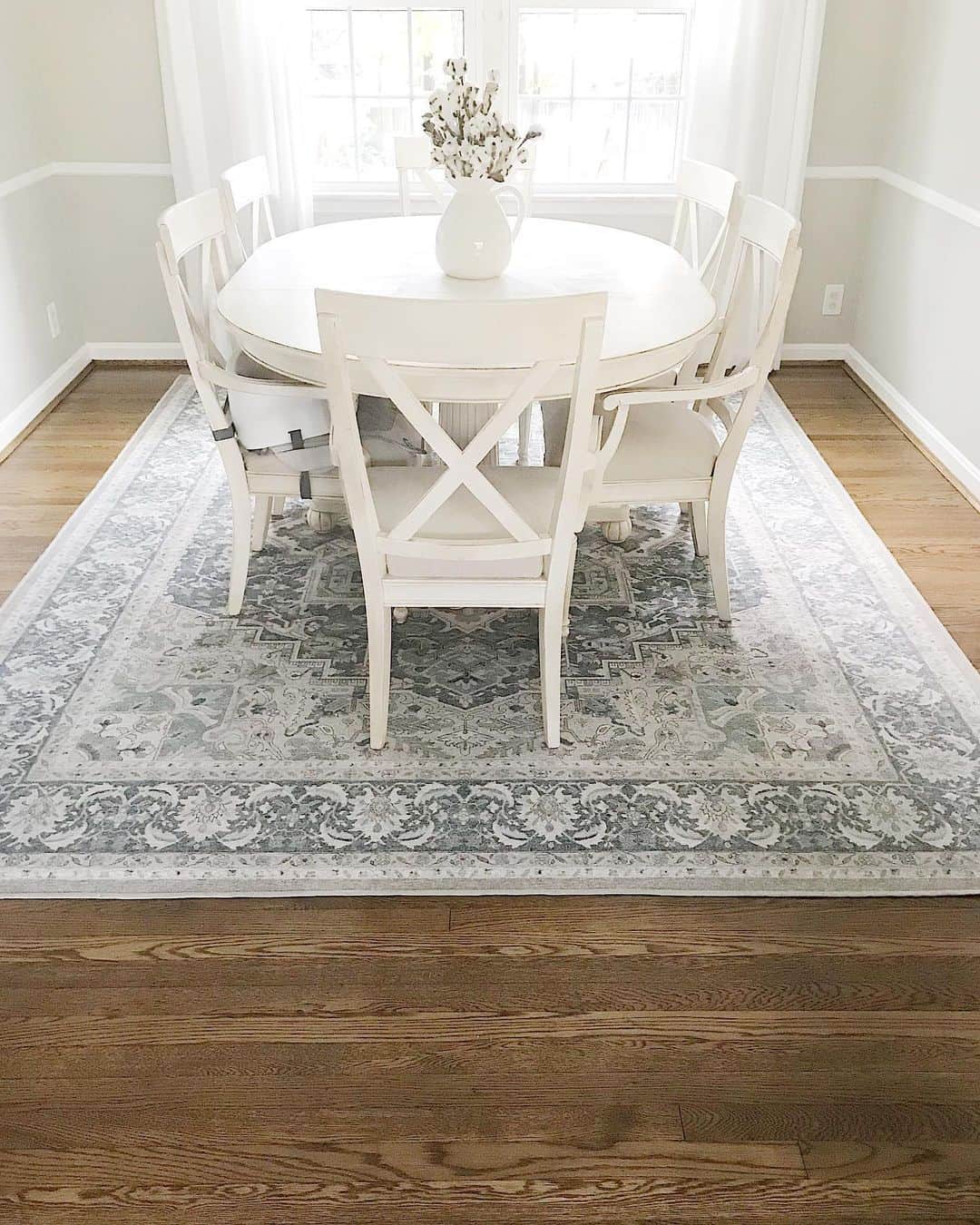 Anchor Your White Dining Set with a Patterned Rug