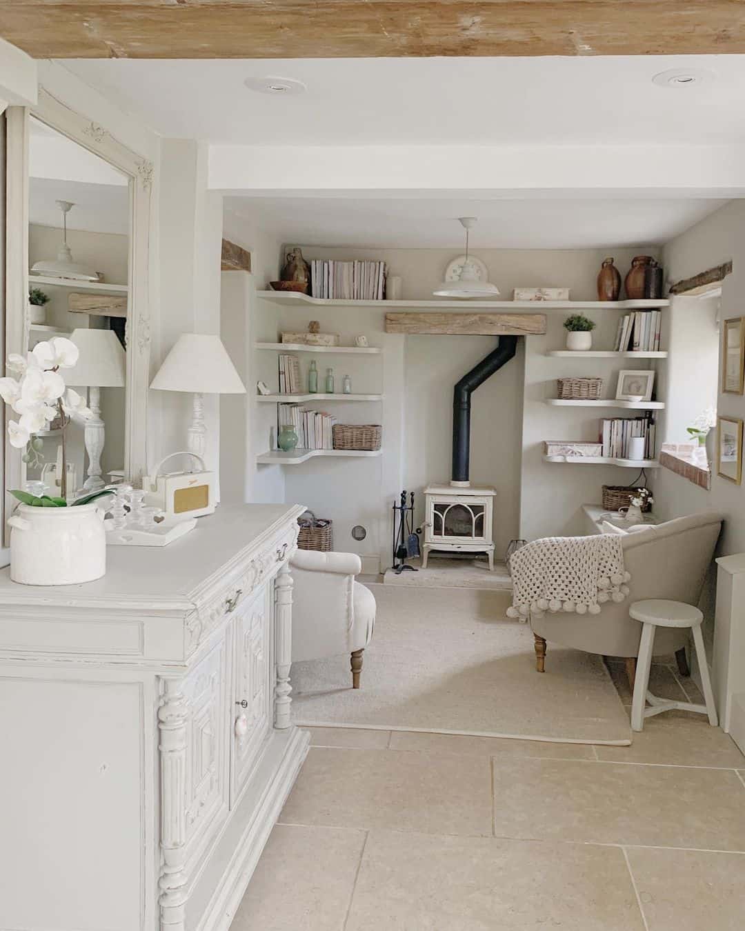 Flank Your Seating Area with White Built-In Shelving