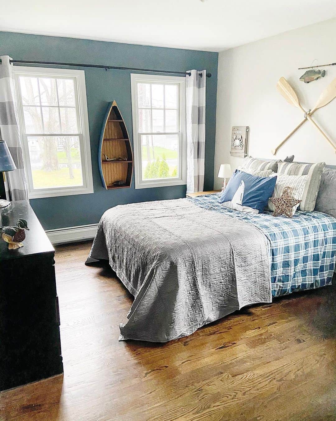 Canoe-Shaped Shelving for Nautical Keepsakes
