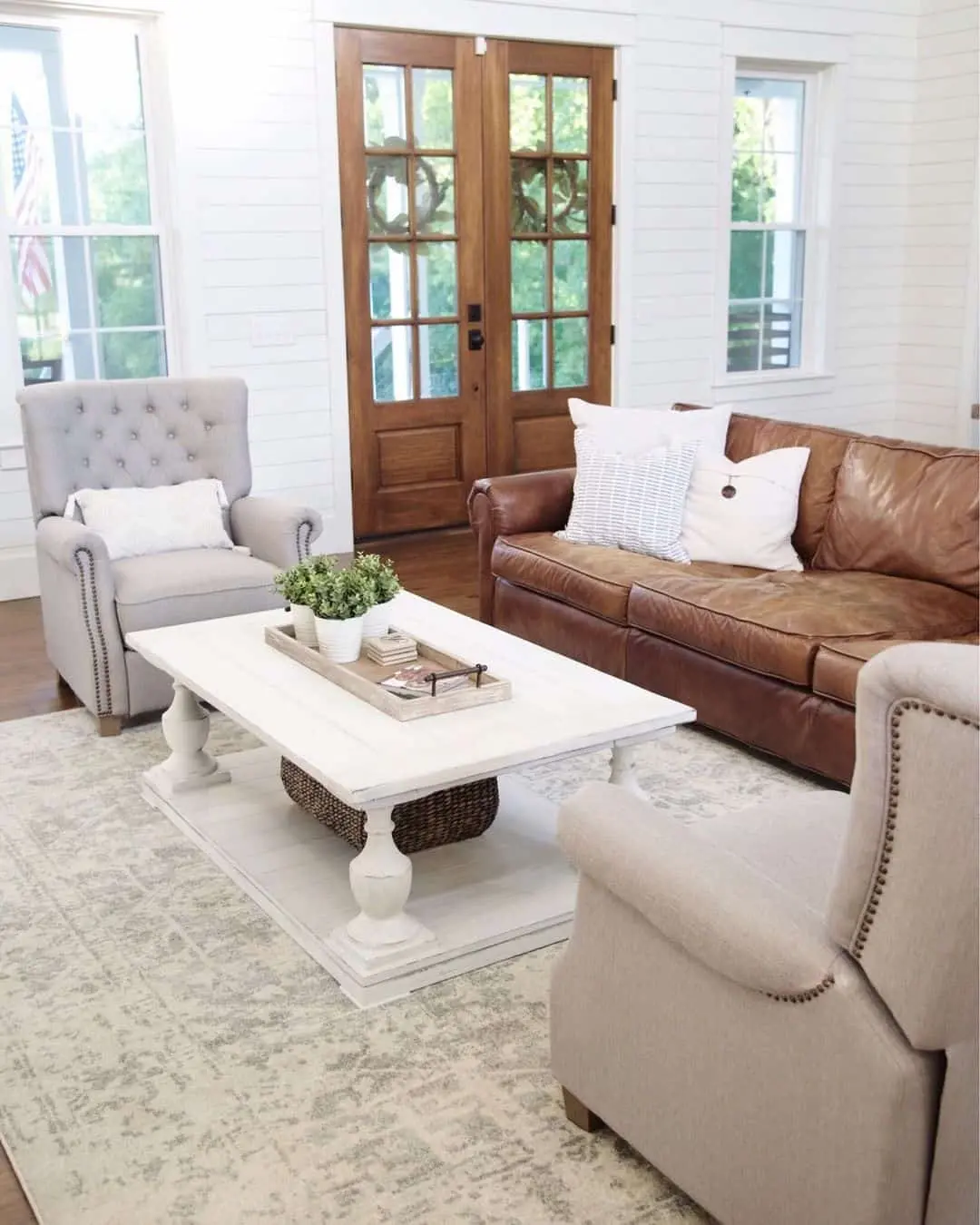 White Pedestal Coffee Table with Lower Shelf Storage