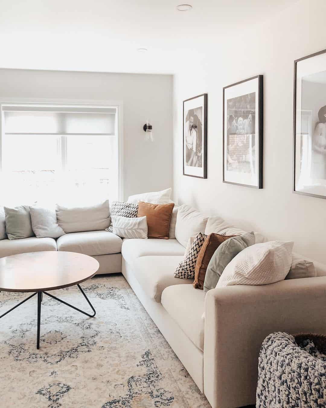Black Framed Art Anchors a Neutral Living Space