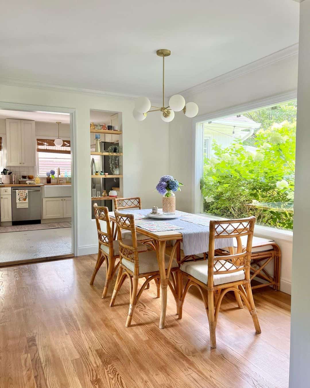 Rattan Chairs and Bench Create a Casual Breakfast Nook