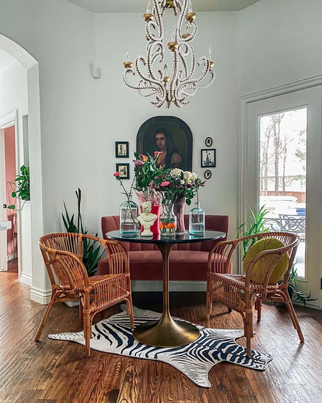 Zebra Print Rugs Ground a Rattan Seating Area
