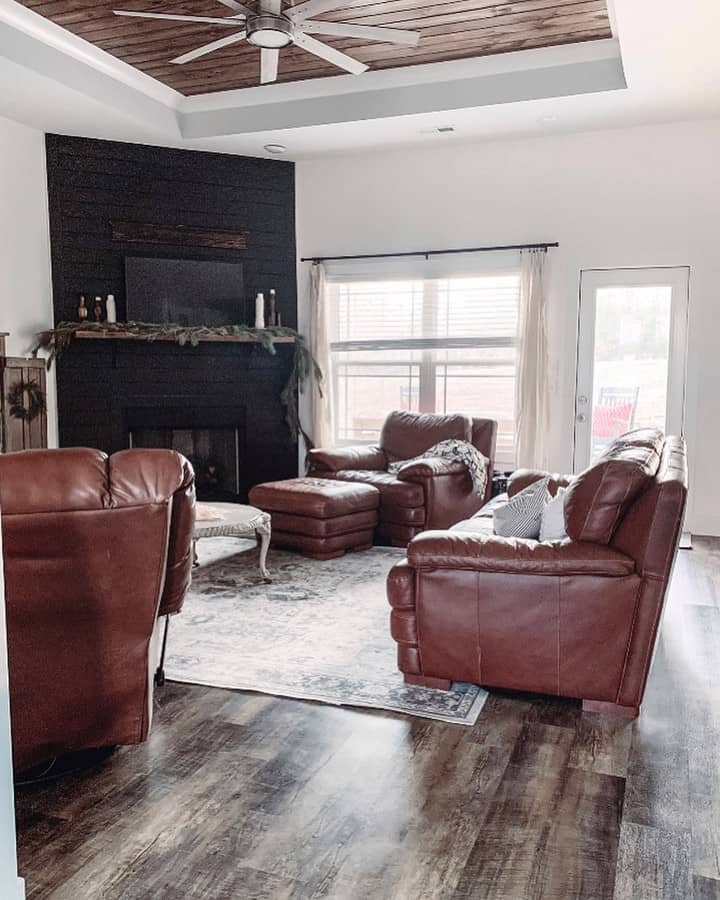 Dark Shiplap Fireplace Creates a Bold Statement Wall