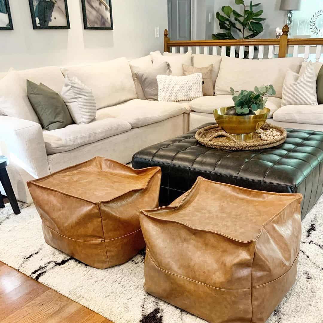 Soft Tan Poufs Provide Casual Seating Around Your Ottoman