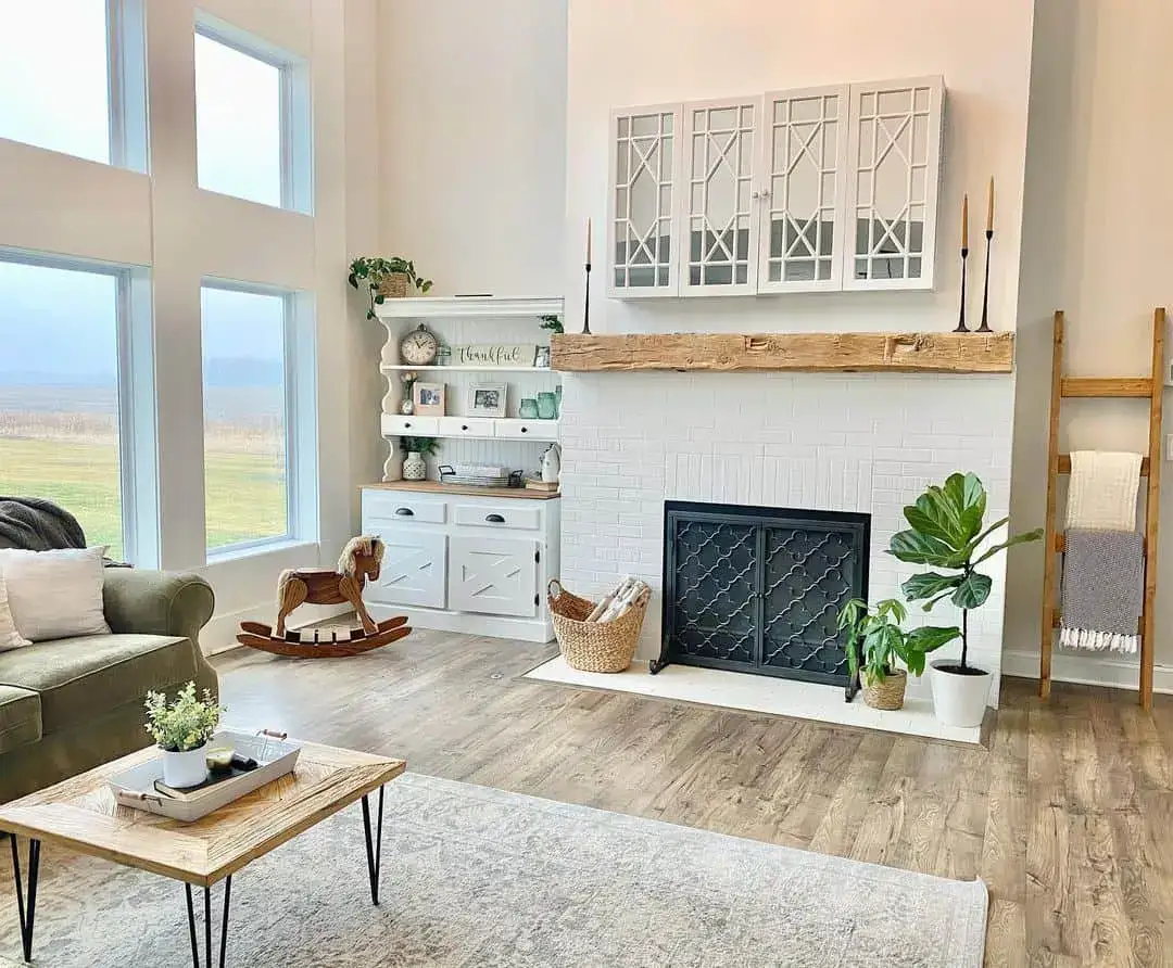 Geometric White Cabinets Add Pattern and Architectural Detail Above the Fireplace