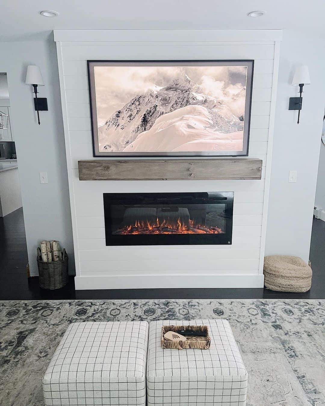 Shiplap Accent Wall Frames Fireplace with Mountain Art for a Natural Scene