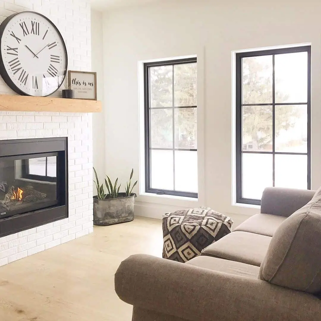 Oversized Round Clock Adds a Bold, Timeless Focal Point Above the Mantel