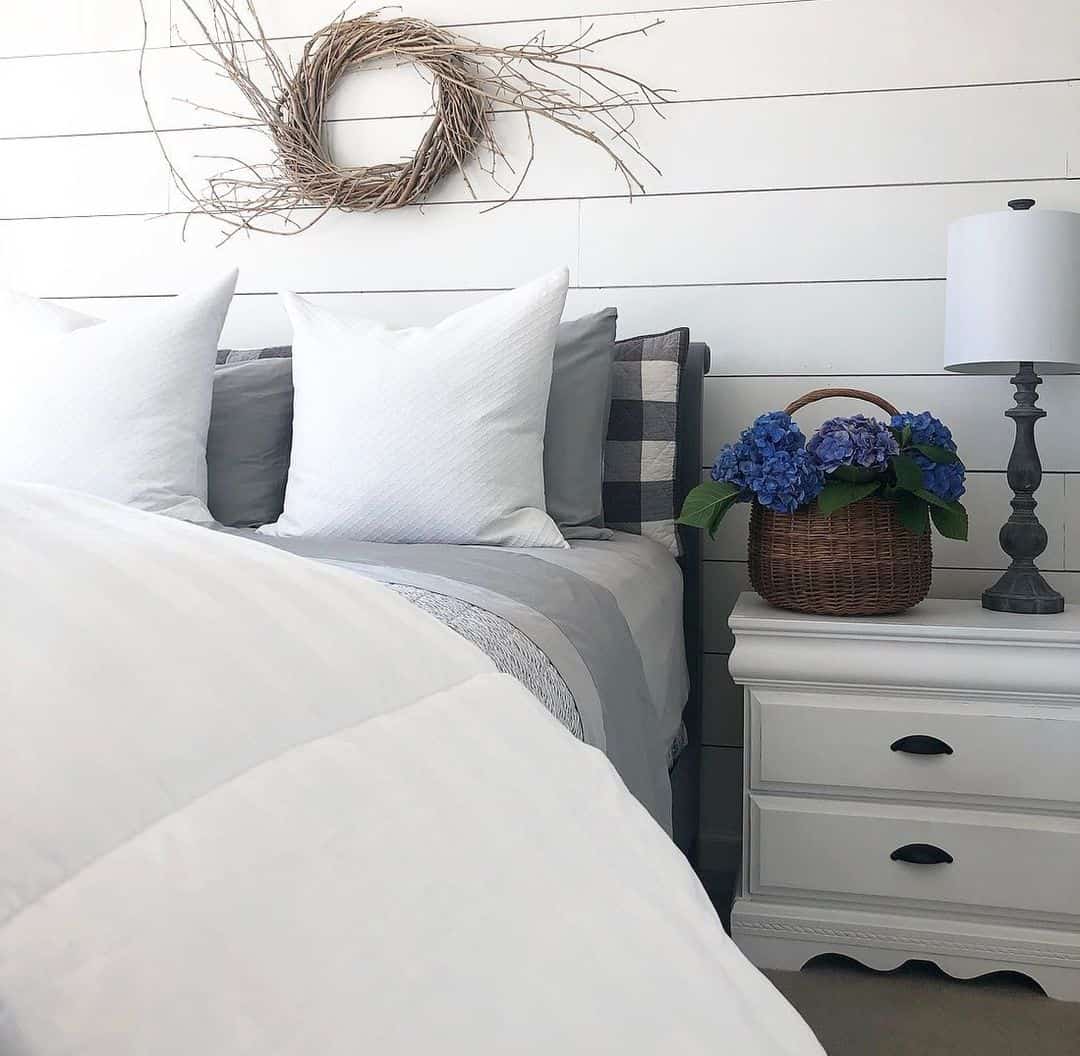 Grapevine Wreath Adds Rustic Texture Above the Bed