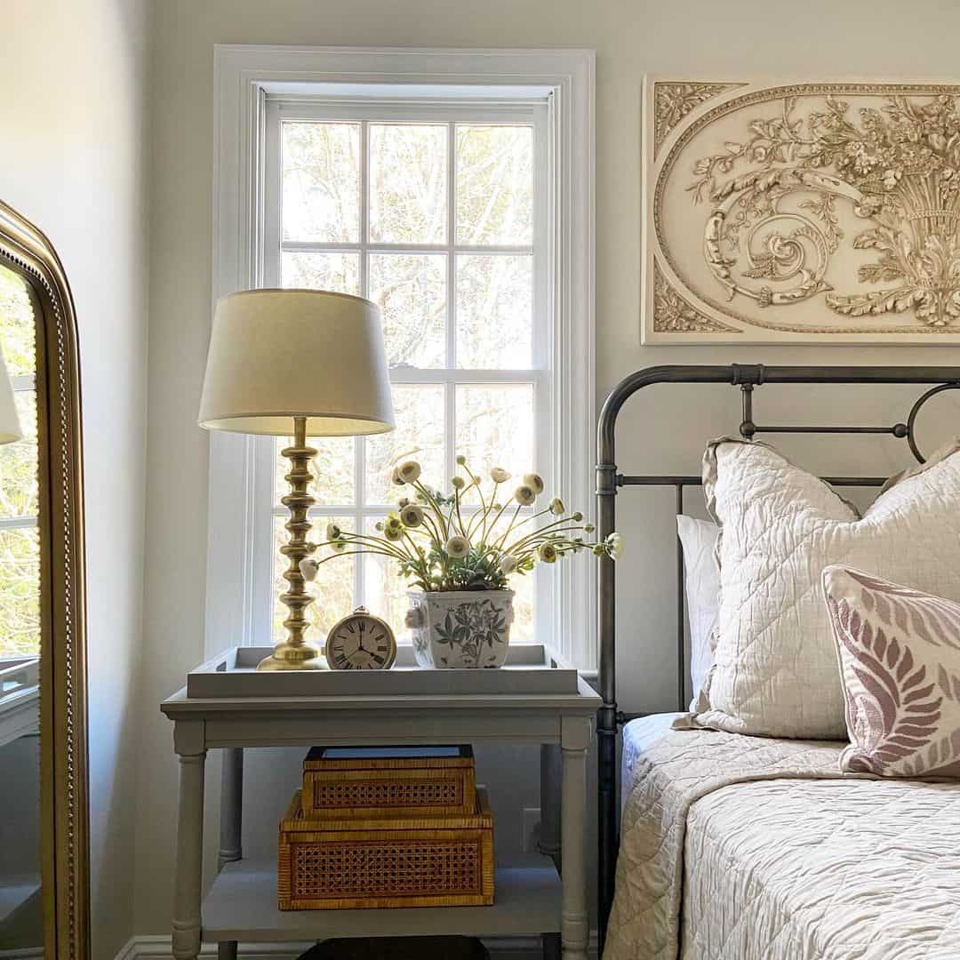 Gray Tray on Bedside Table Holds Lamp and Flowers