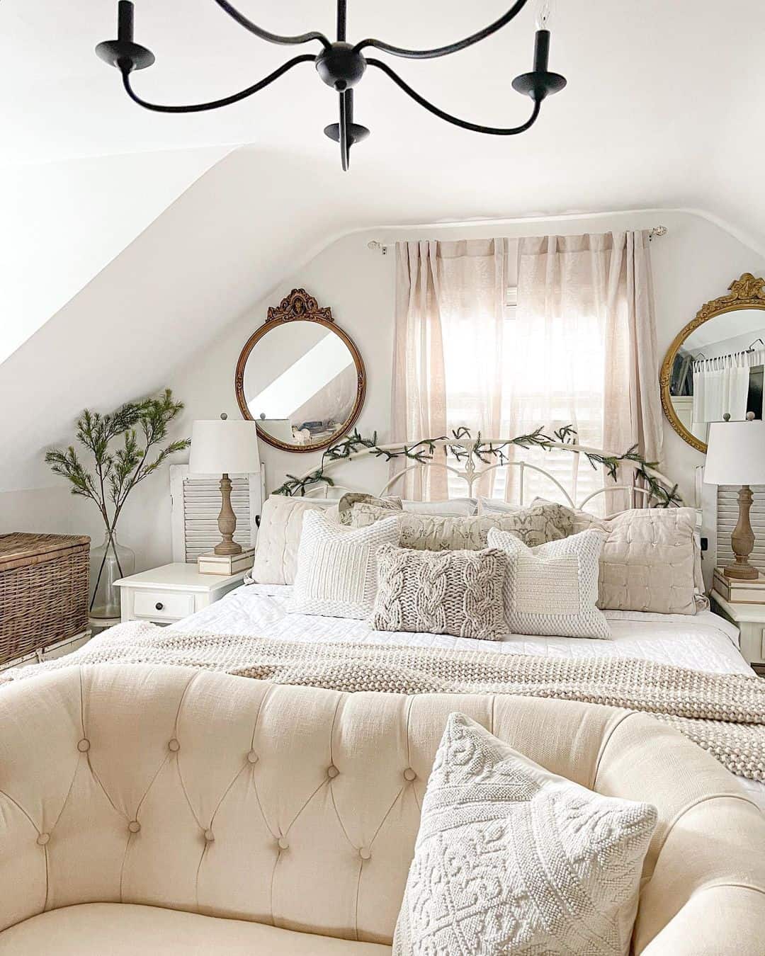 Ornate Gold Mirrors Flank a Window with Sheer Drapes