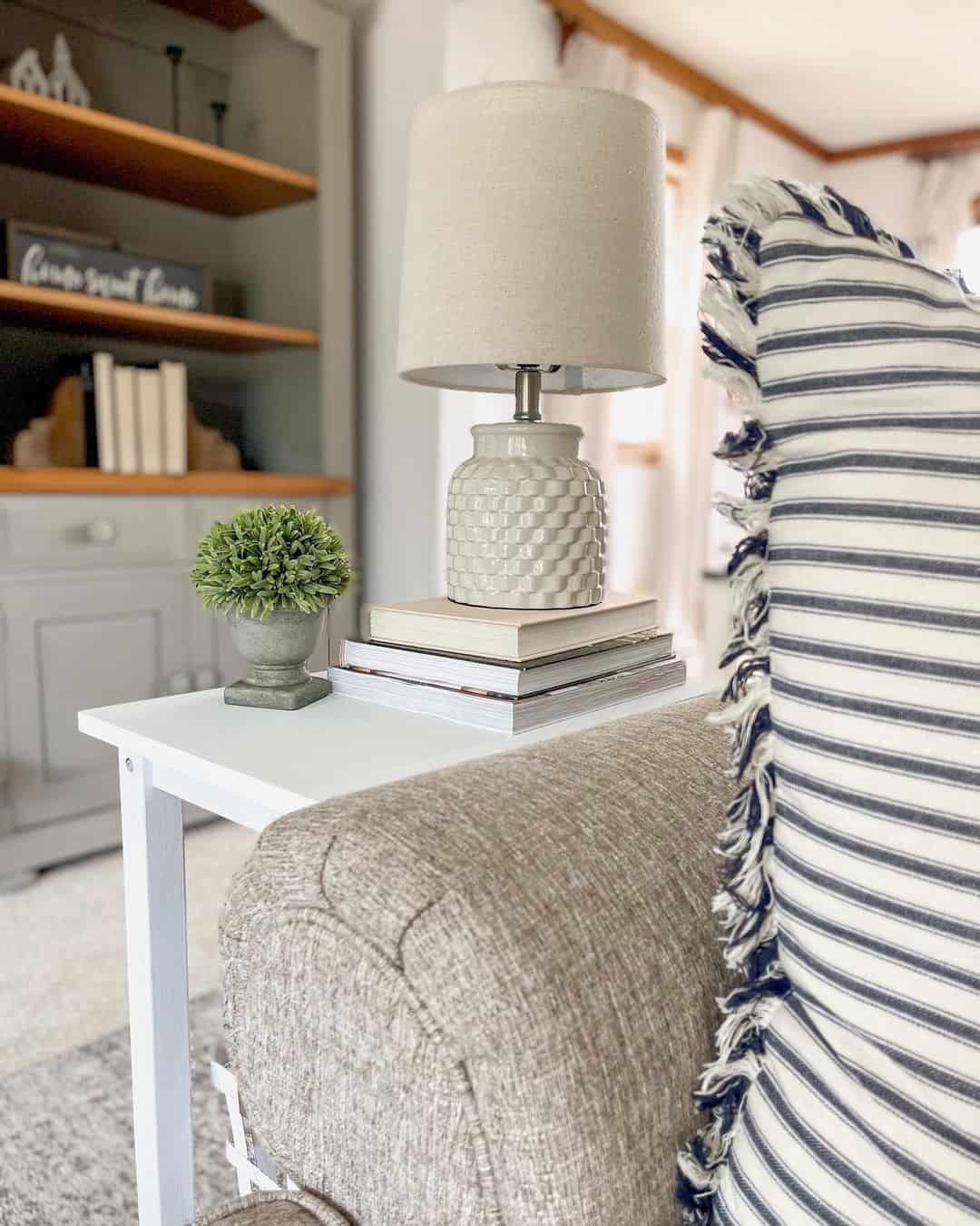 Stack books to add height to a textured lamp