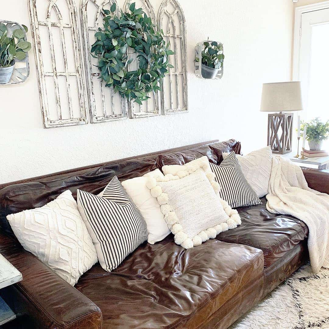 White Textured Pillows With Pom-Pom Trim Add Cozy Dimension
