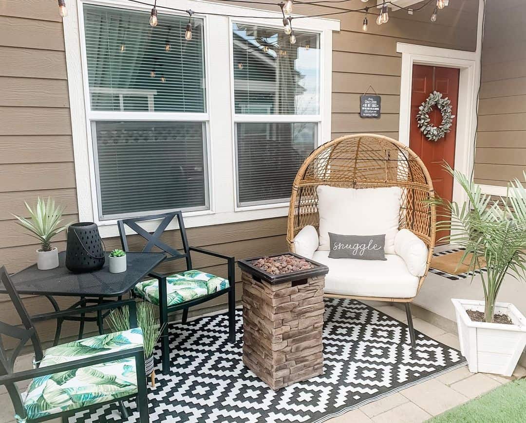 Woven Egg Chair Creates a Cozy Outdoor Reading Nook