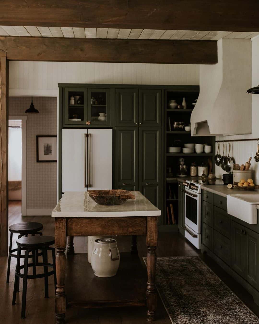 Wooden Island With Marble Top Anchors The Kitchen Space