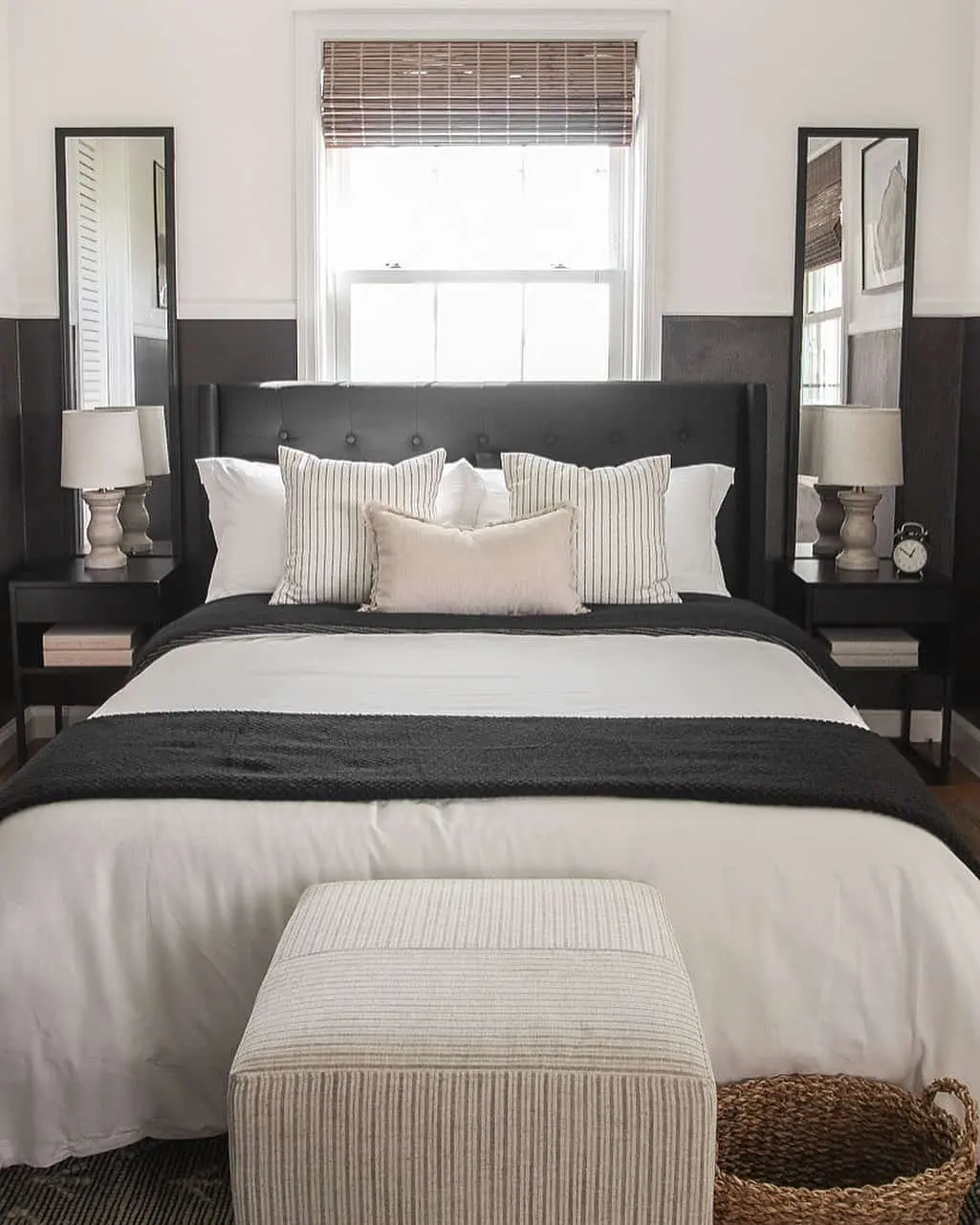 Tall Mirrors Flank Bed for Symmetry and Light