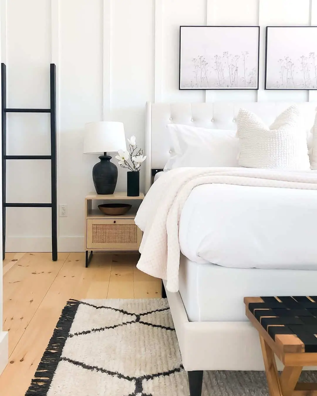Black ladder adds vertical interest and graphic contrast