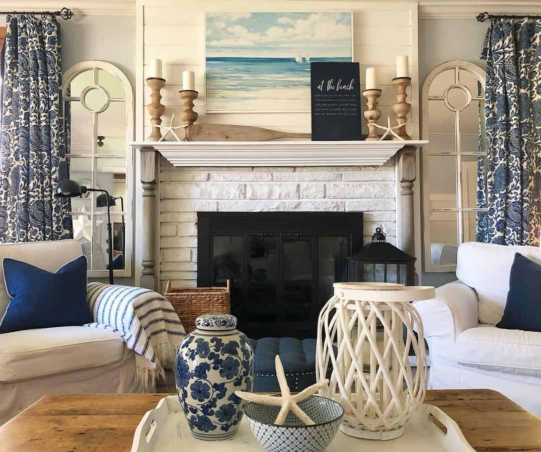 Arched Window Pane Mirrors Frame the Fireplace