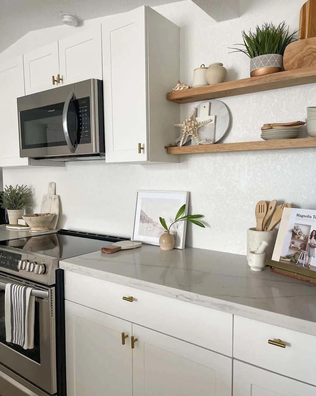 Floating Shelves Display Coastal Accents and Greenery