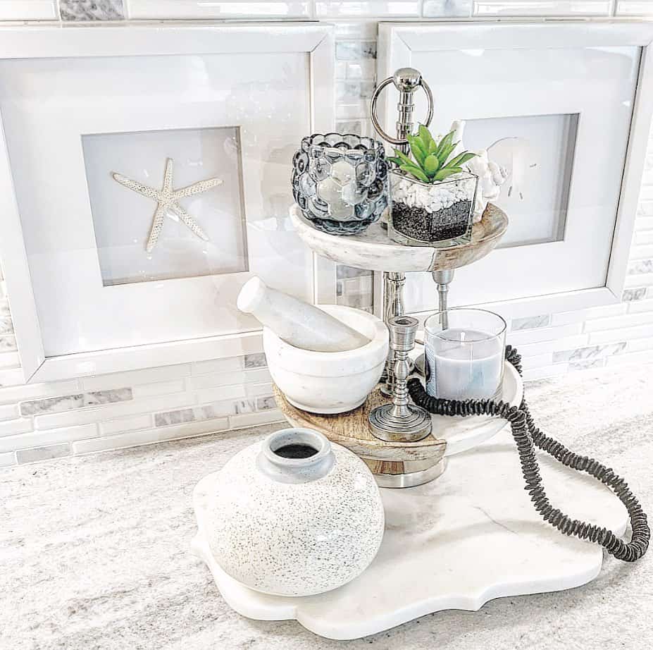 Tiered Tray Displays Coastal Accents and Greenery