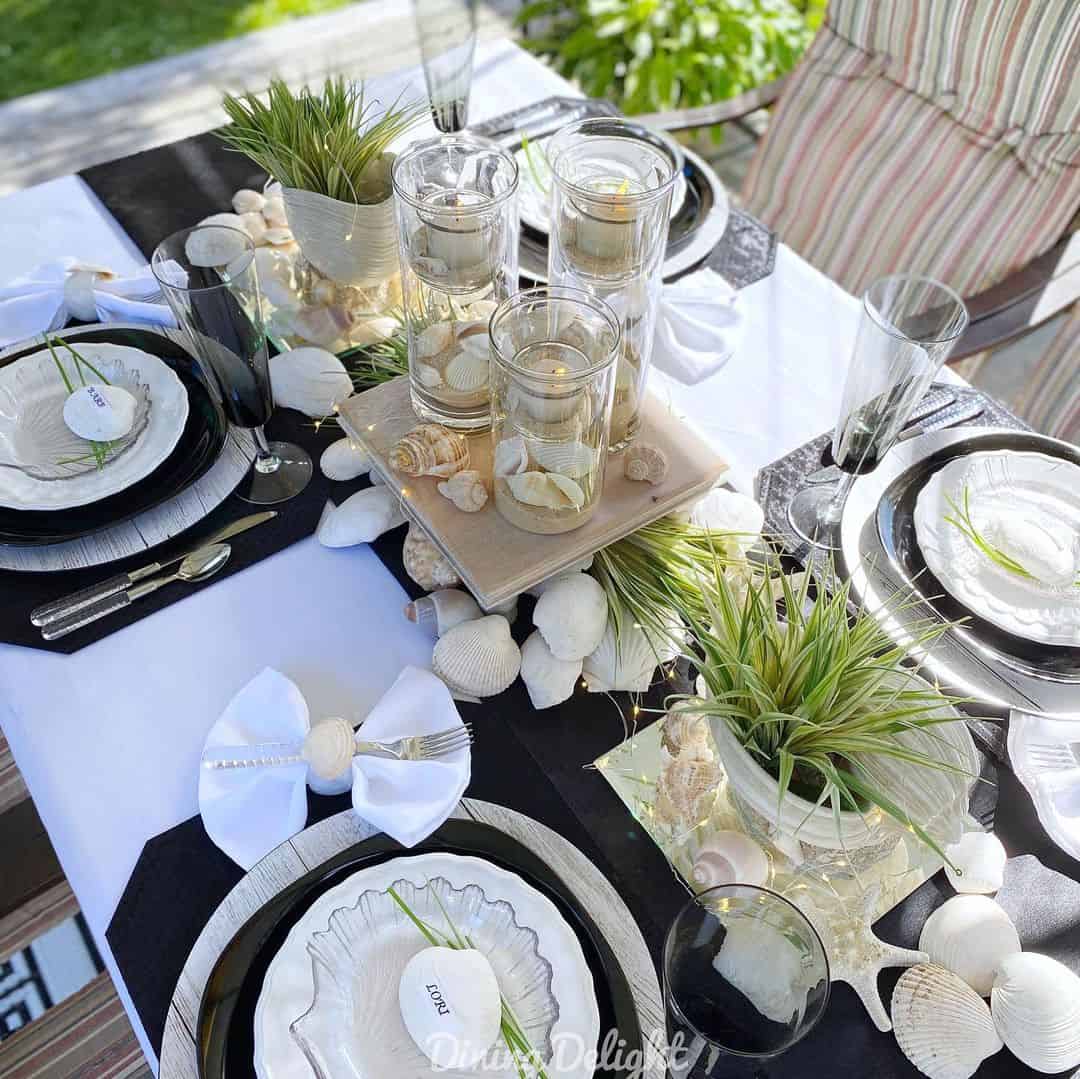 Glass Cylinders Filled With Sand and Shells for Table Ambiance