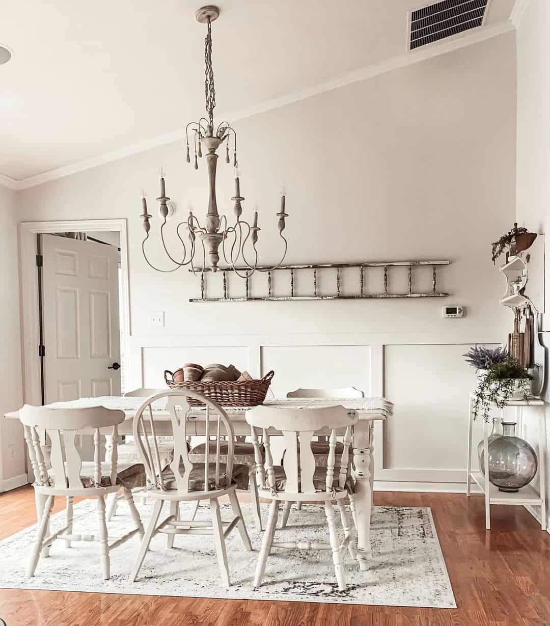 Utilize a Distressed Ladder for Rustic Wall Storage