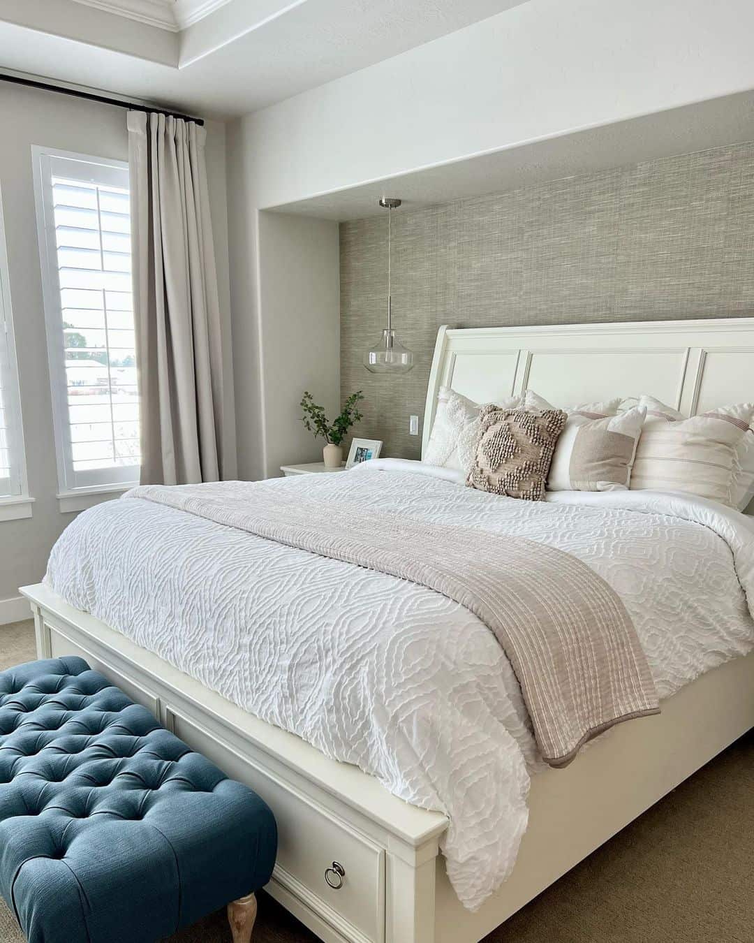 Textured Wallpaper Creates an Accent Wall Behind the Headboard