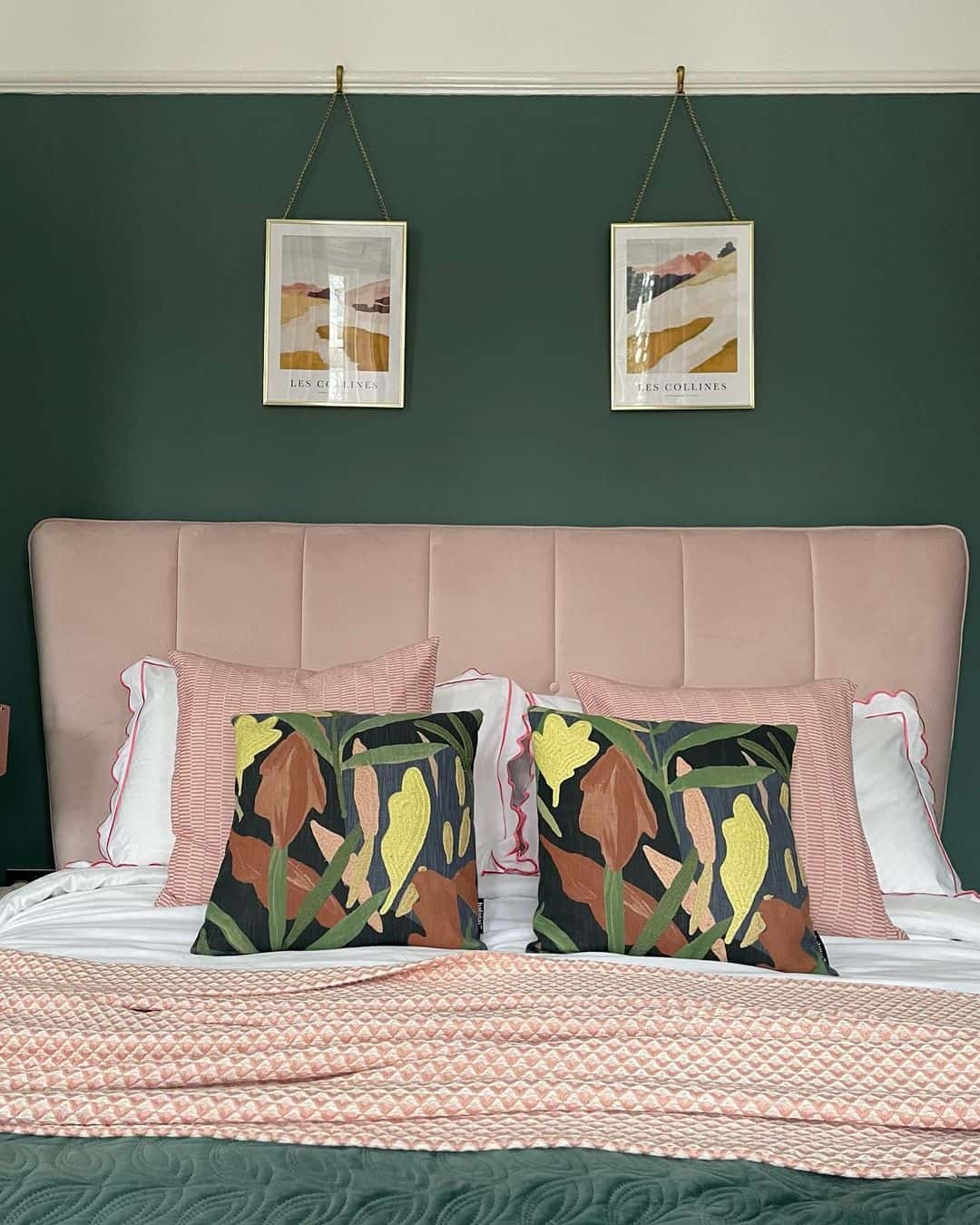 Framed Abstract Art Hung Above a Tufted Headboard