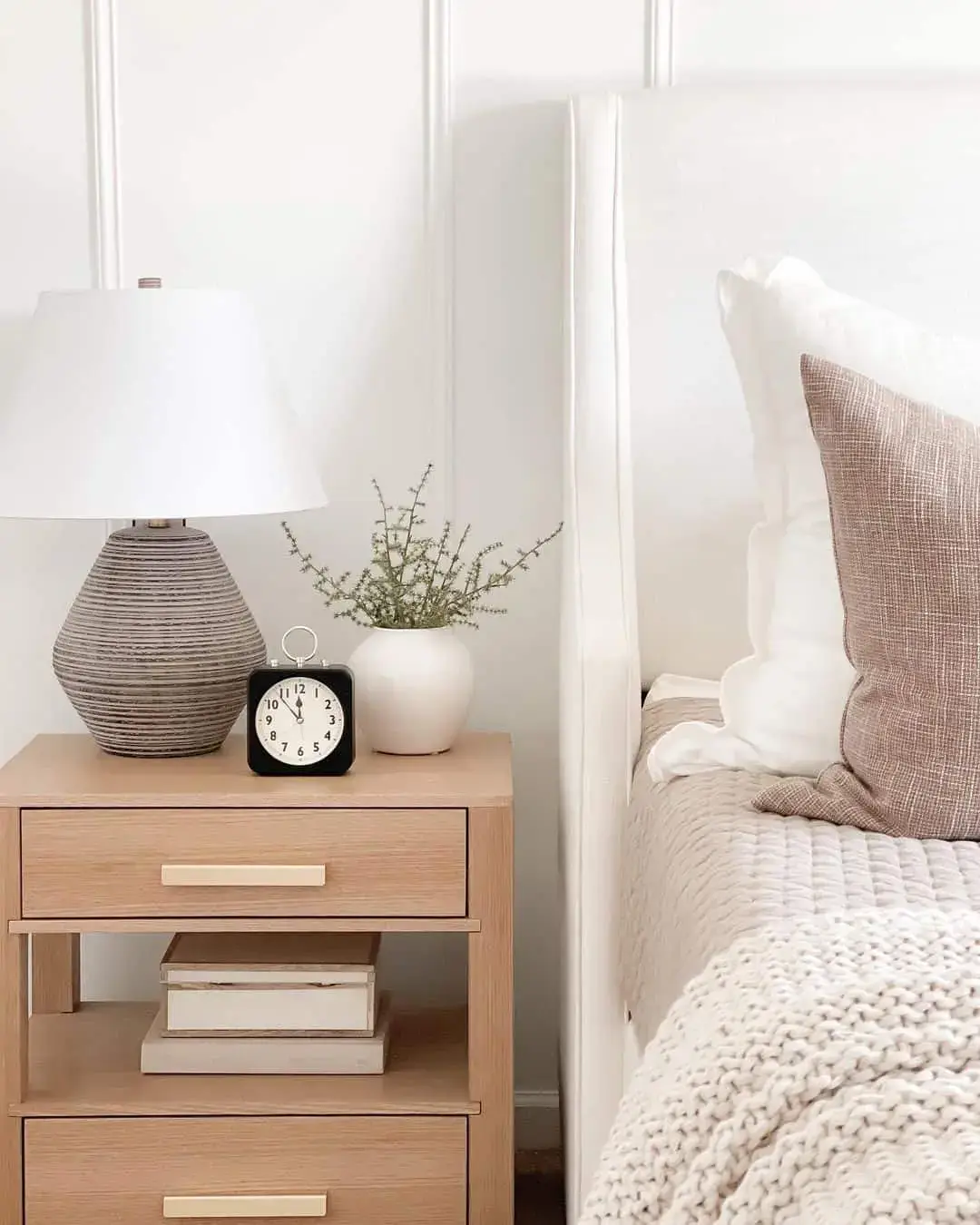 Light Wood Nightstand Adds Warmth to White Bedroom Accents