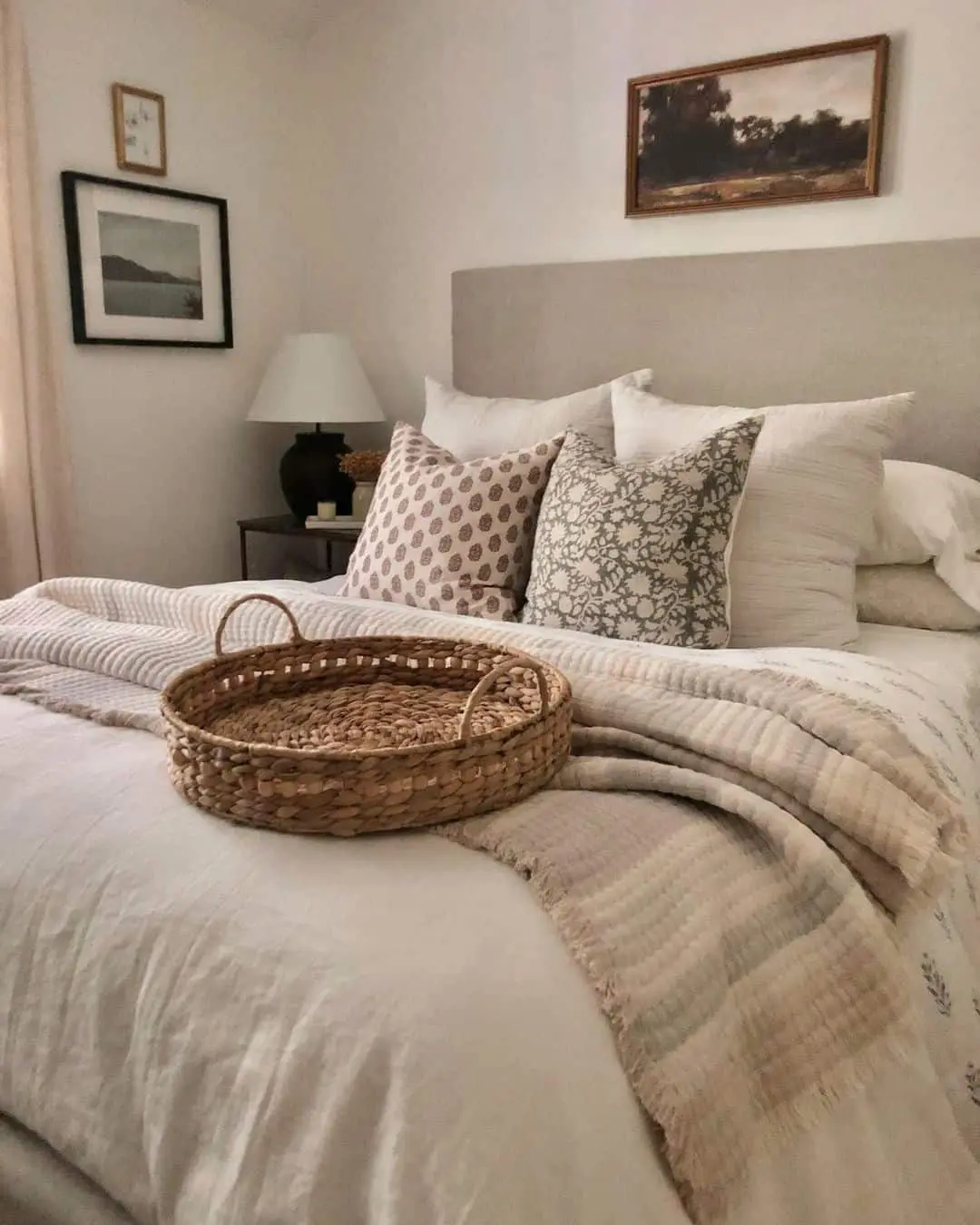 Introduce Organic Texture With a Round Woven Tray on the Bed