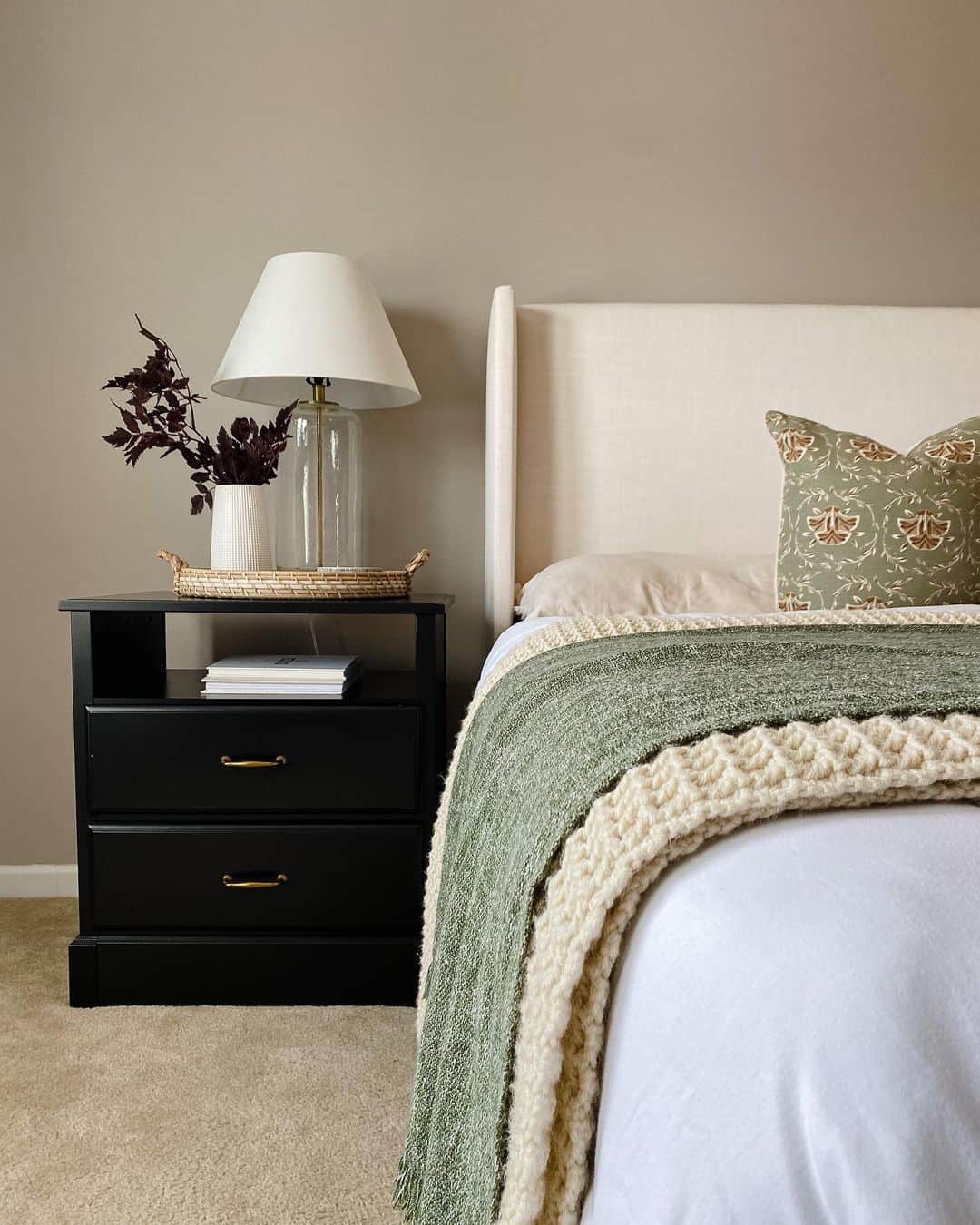 Anchor Your Bedside With a Black Nightstand and Woven Tray