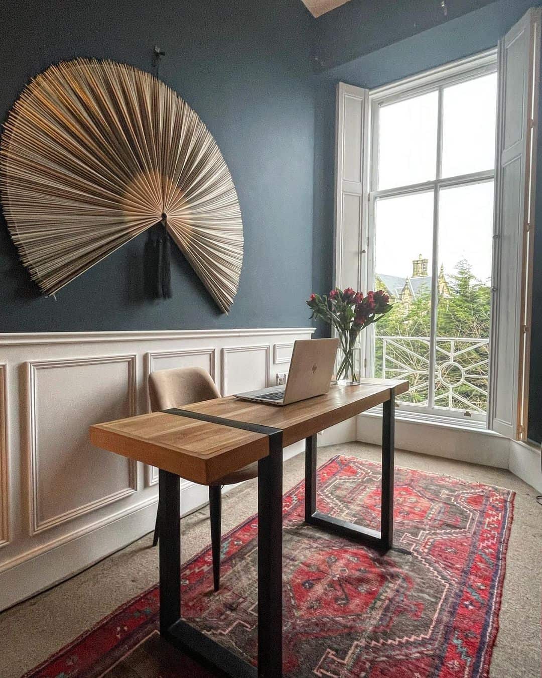Fan-Shaped Wall Art Adds Organic Texture to a Dark Wall