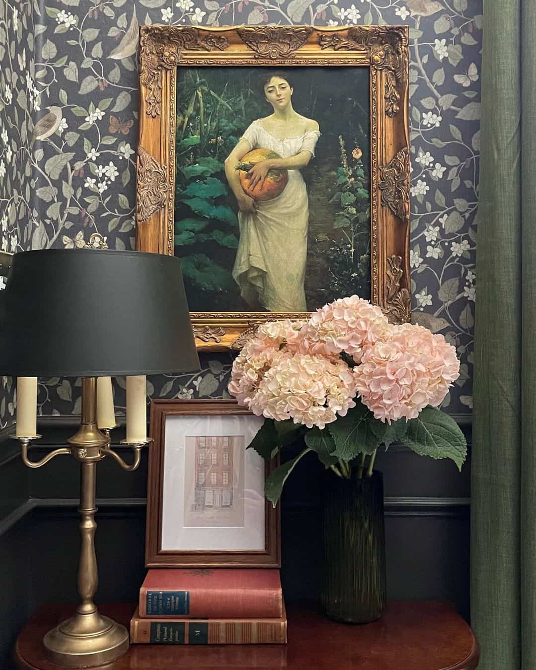Layered Vintage Books and Art Create a Richly Textured Vignette