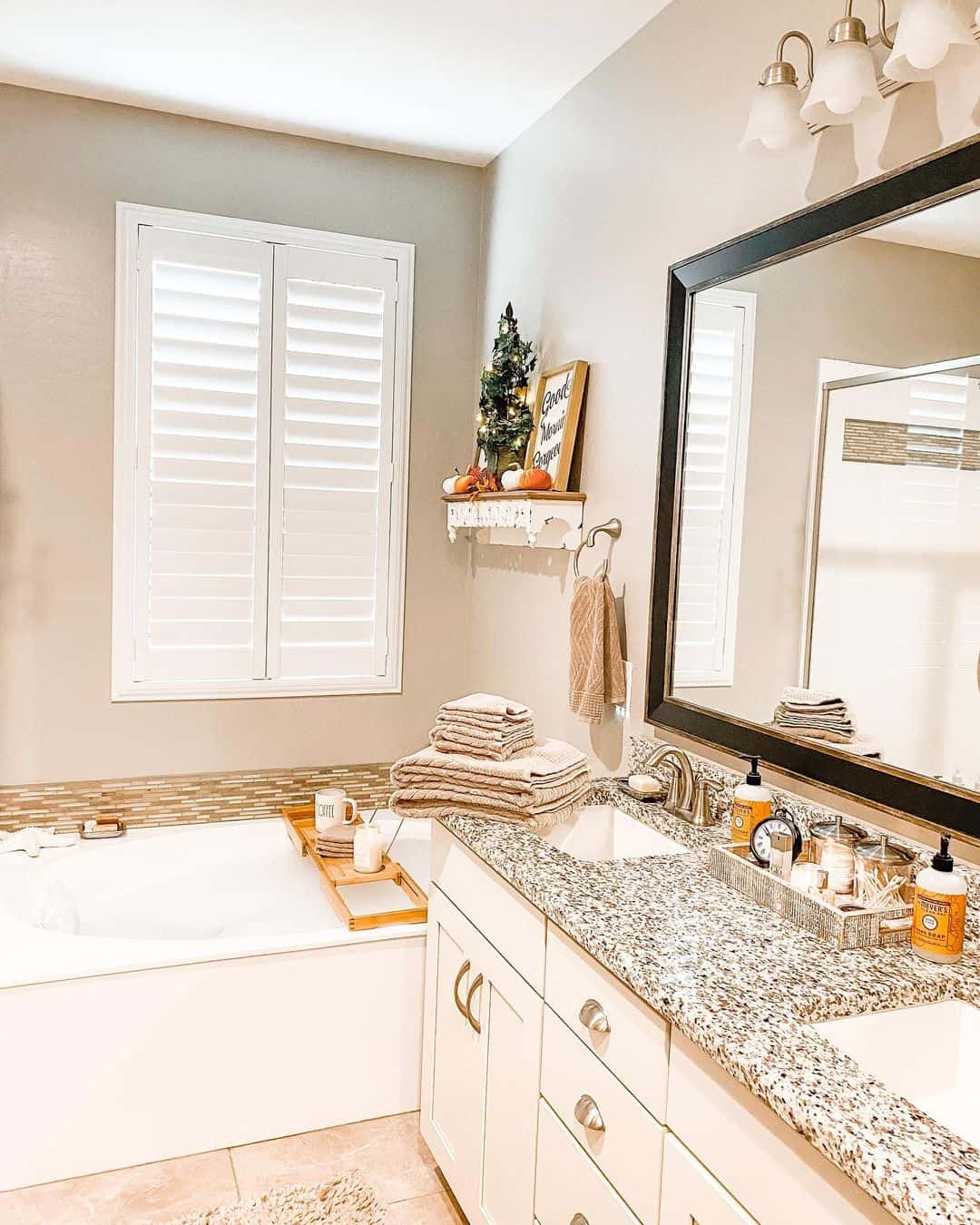 Anchor Your Granite Vanity with a Black Frame Mirror