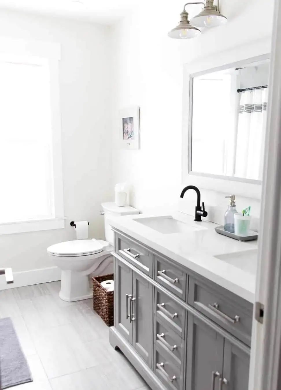 Choose Sleek Silver Hardware for a Gray Double Vanity