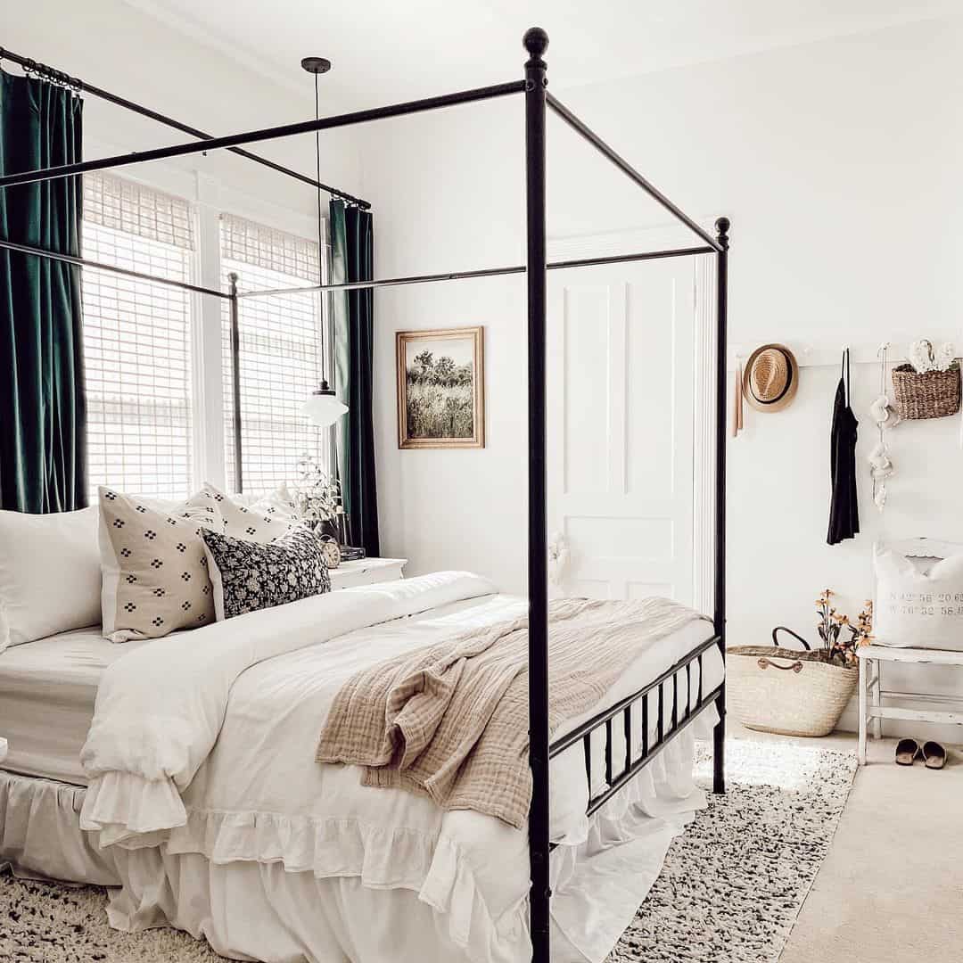 Black Metal Canopy Bed Frame with Ruffled Bed Skirt