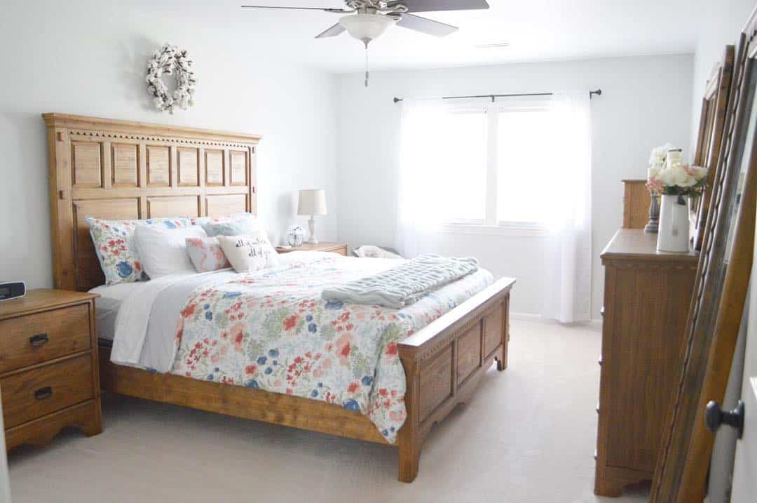 Incorporate Rustic Charm with a Wooden Headboard's Carved Detail