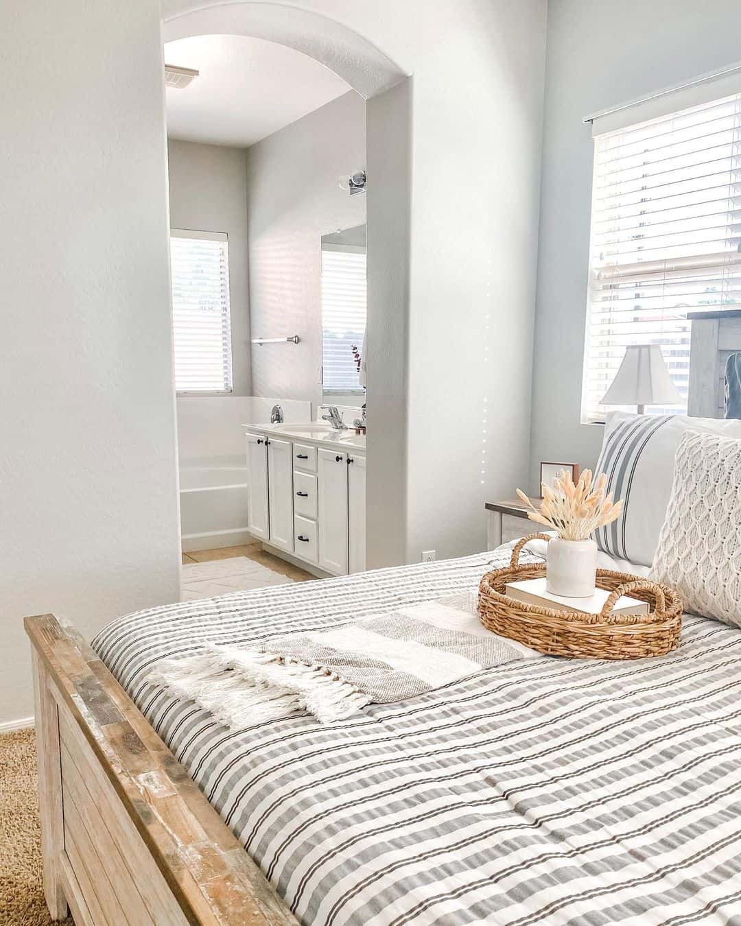 Place a Woven Tray with Dried Stems on Your Bed for Texture