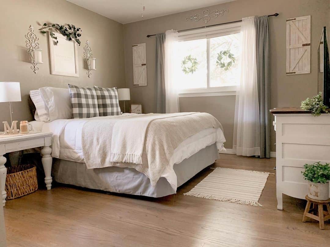 Frame a Mirror with Ornate Wall Sconces for Old-World Charm