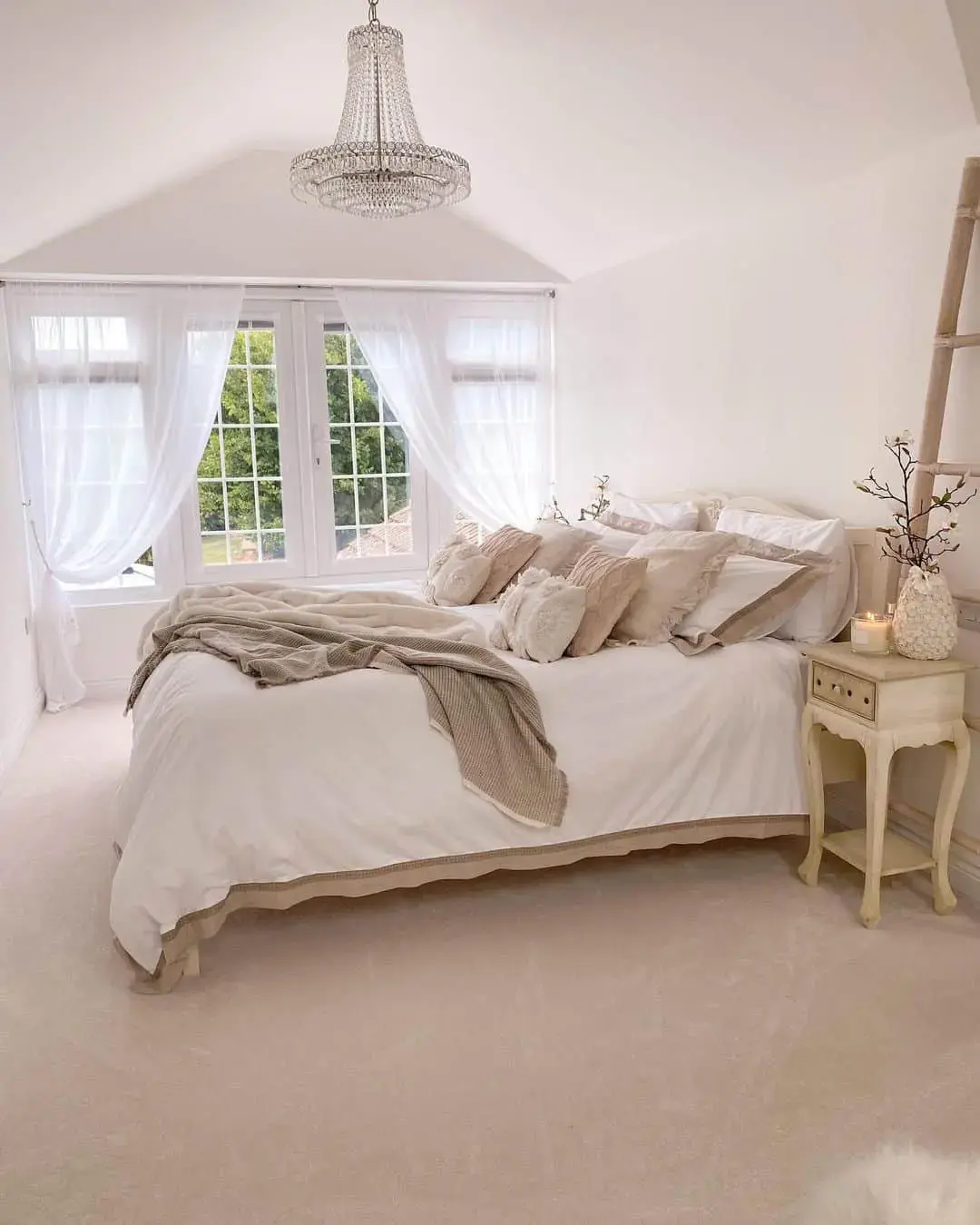 Introduce Glamour with a Crystal Chandelier in an Attic Bedroom