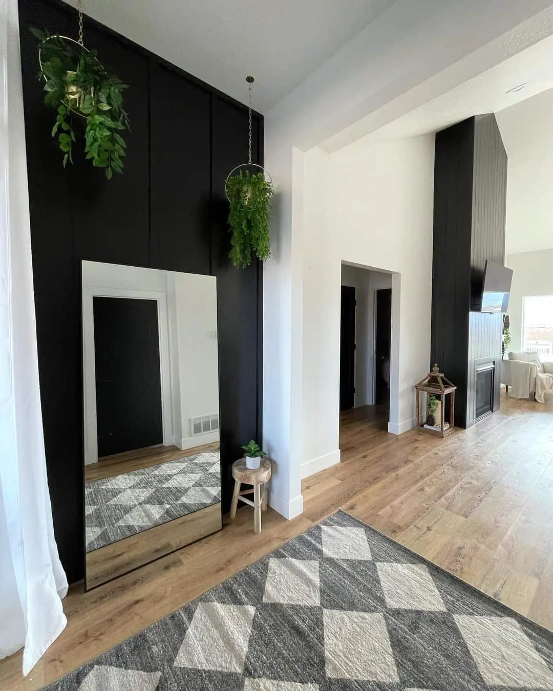 Double the Impact of Your Rug with a Floor-Length Mirror