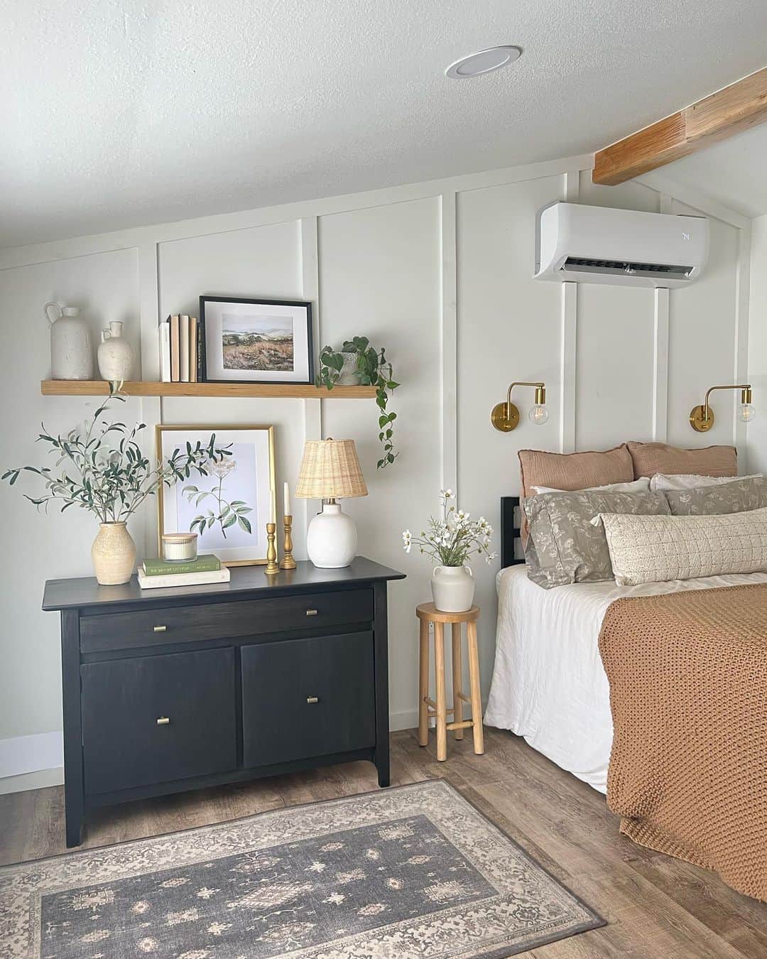 Board and Batten Walls Frame a Dark Dresser