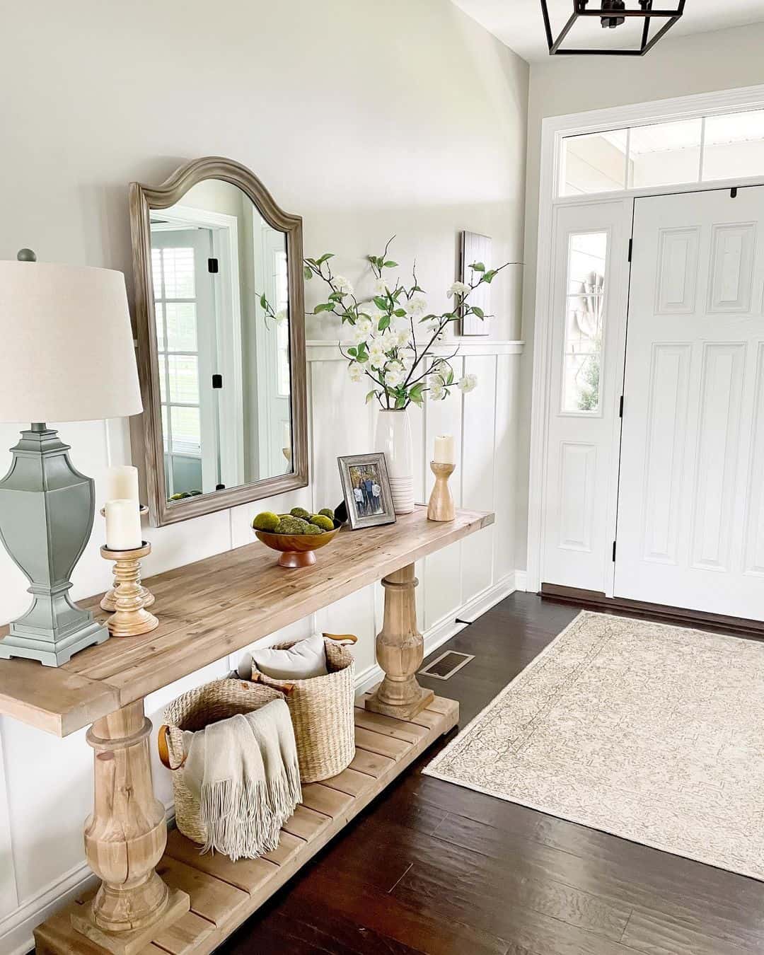 Wooden Console Table Holds Baskets for Hallway Storage